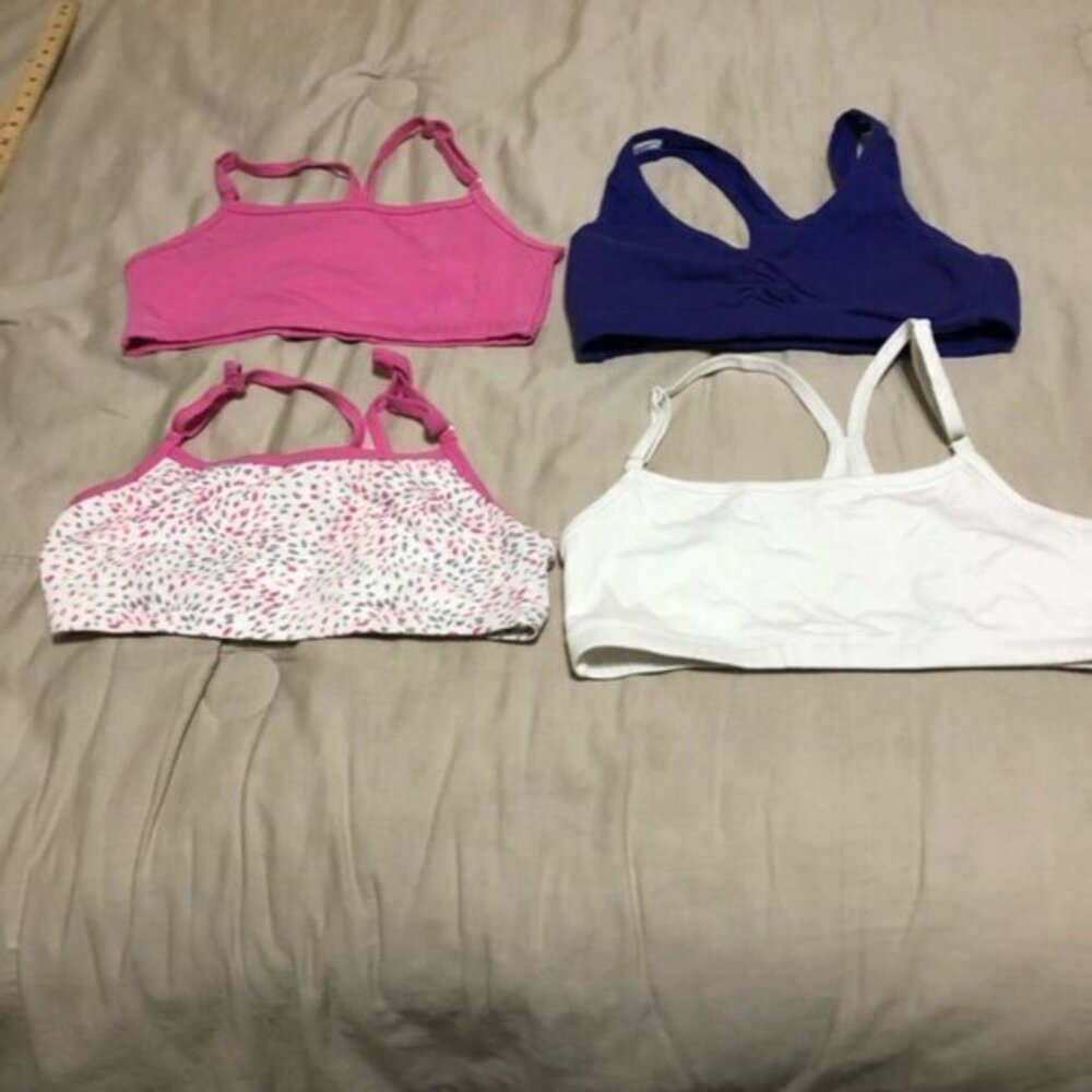 Set of 4 size medium sports bras NWOT